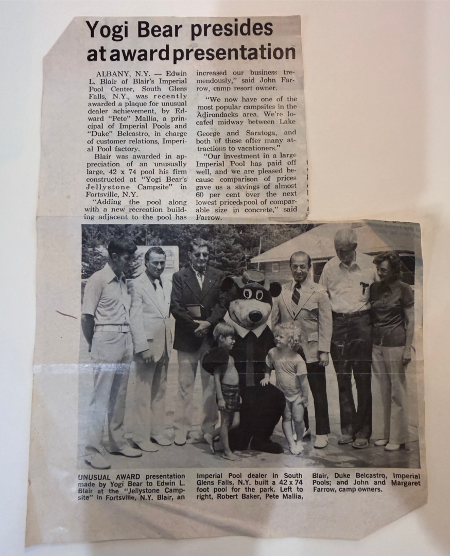 Yogi Bear mascot with people